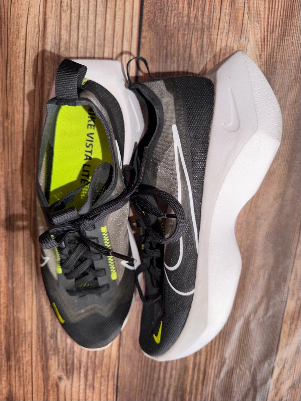 Nike woman’s 8.5 Black & Neon Yellow Athletic Running Shoes